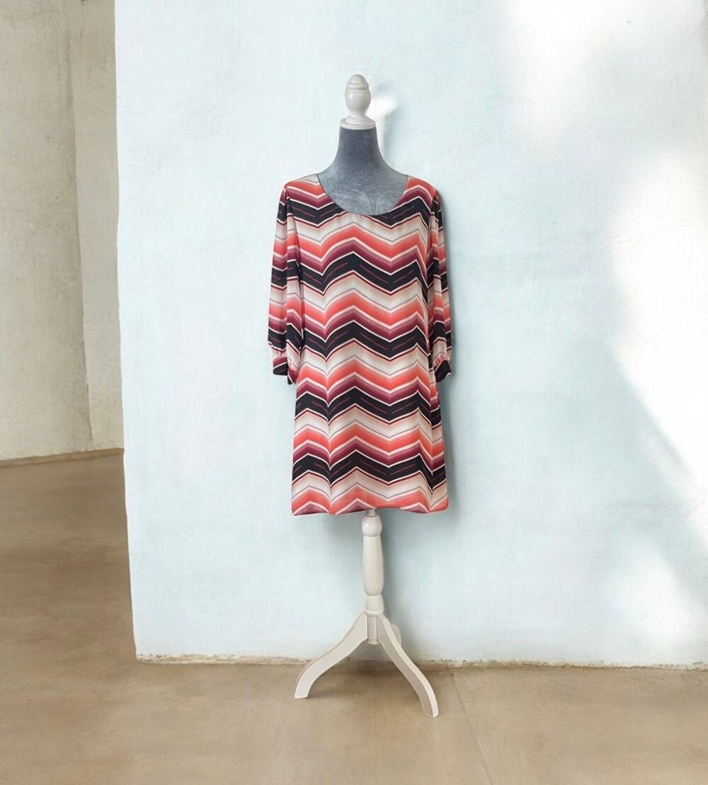 This is a HeartSoul chevron print tunic dress with 3/4 sleeves Size large